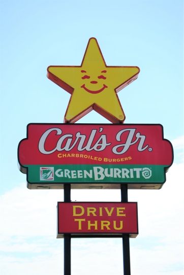 Carl&rsquo;s Jr. pole sign with drive-thru panel